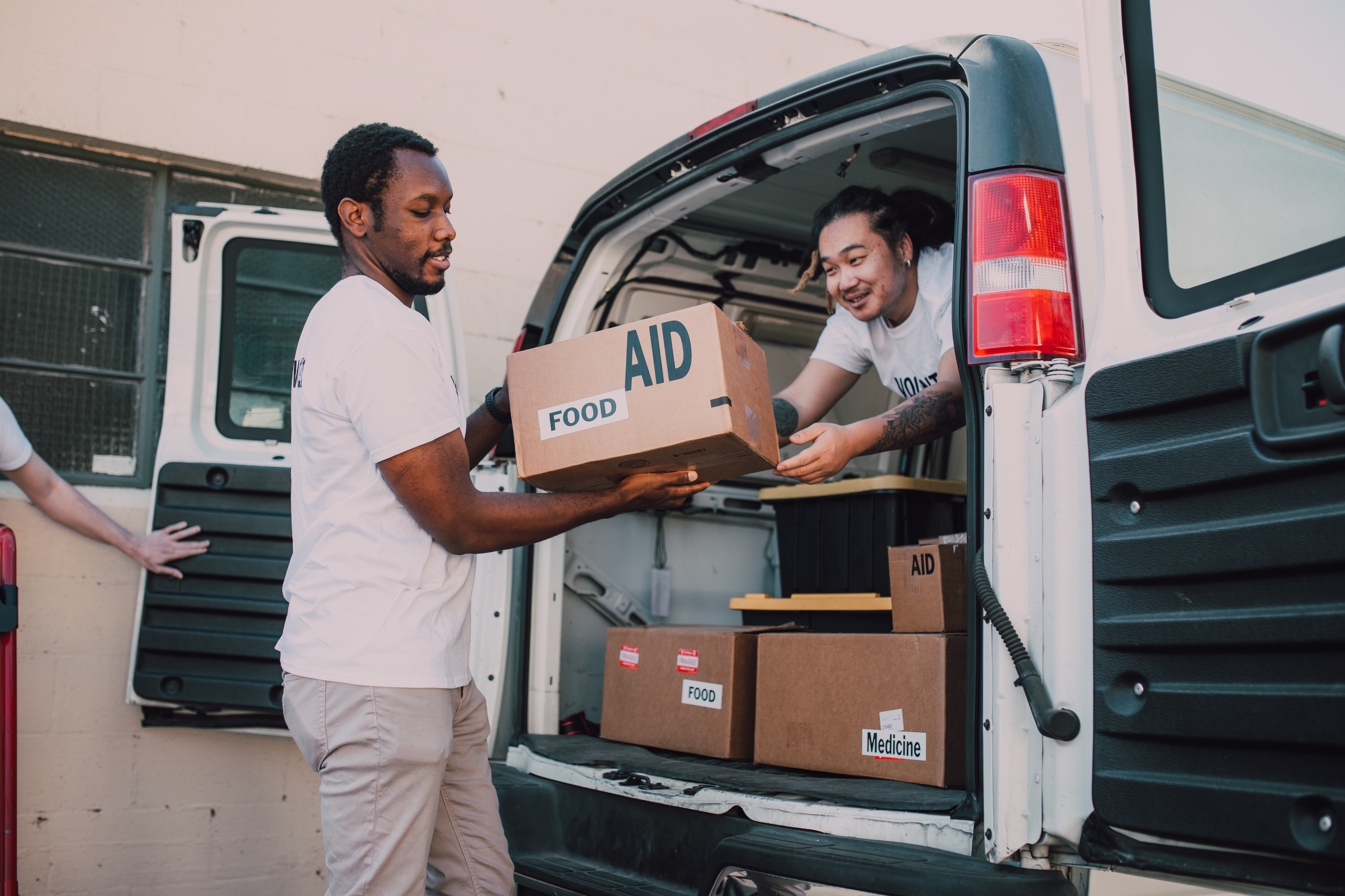 Volunteers moving items